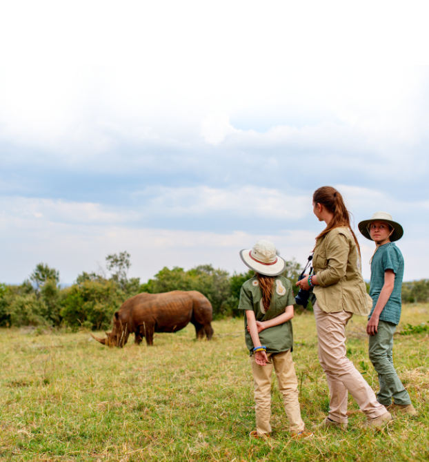 tourists watching rhino
